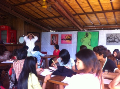 Poet Nyein Way doing a workshop on conceptual poetry and women